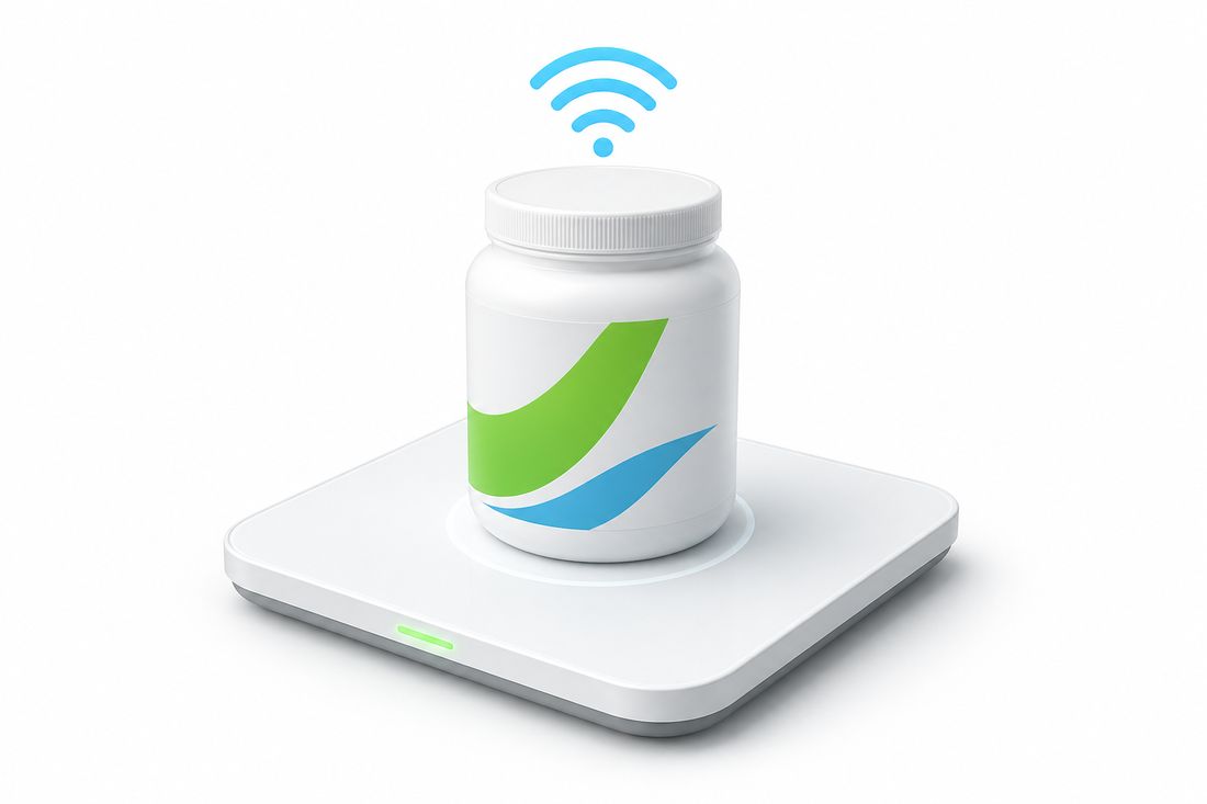 白い重量センサーパッドの上に在庫容器が載り、WiFiの電波マークが表示されているコンセプトイメージ